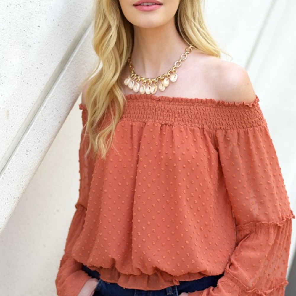 Burnt orange blouse